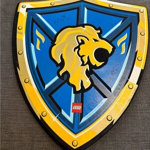 Legoland sword and shield. Used as shown in pictures.